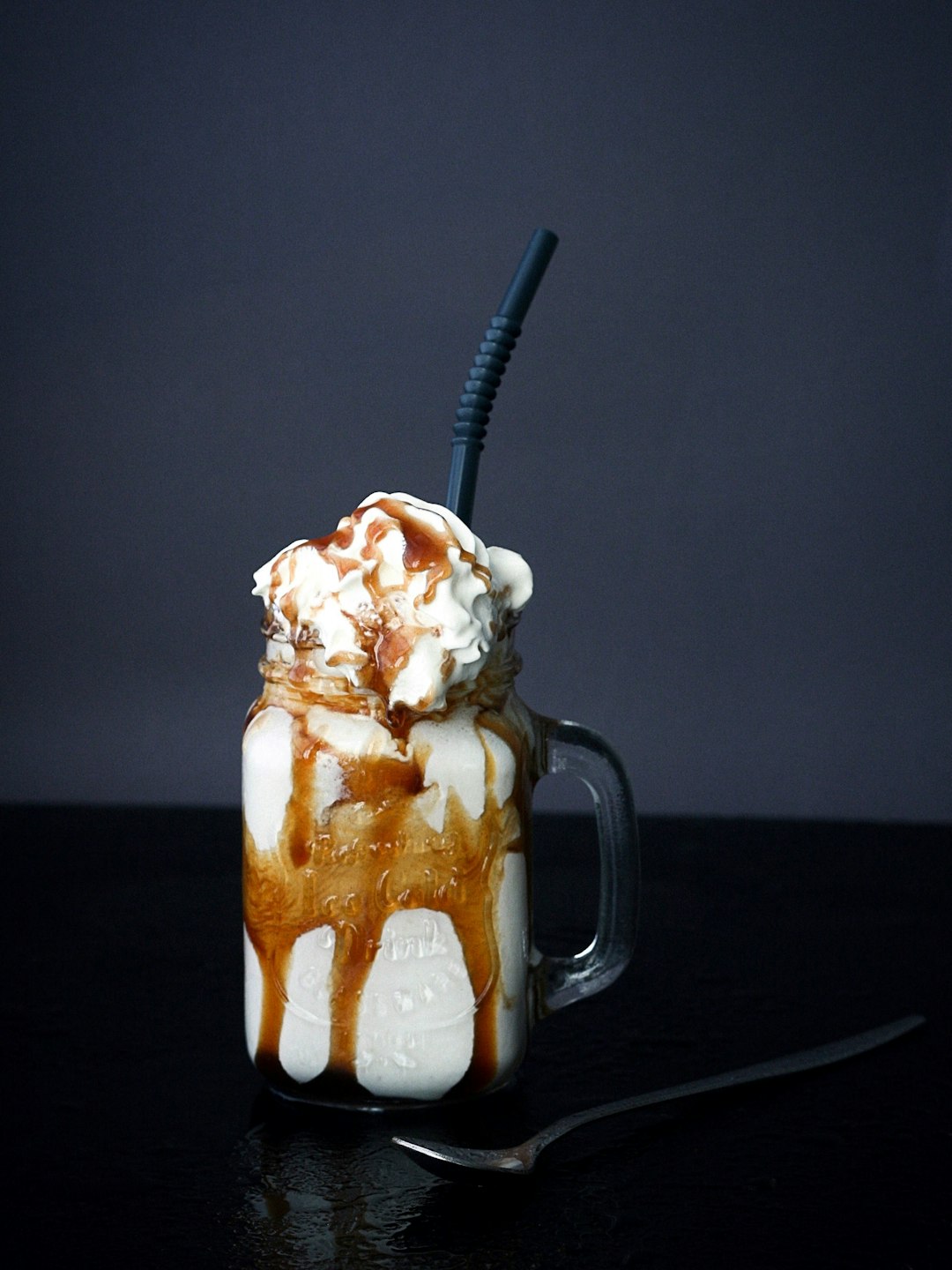 Date caramel shake overflowing its jar